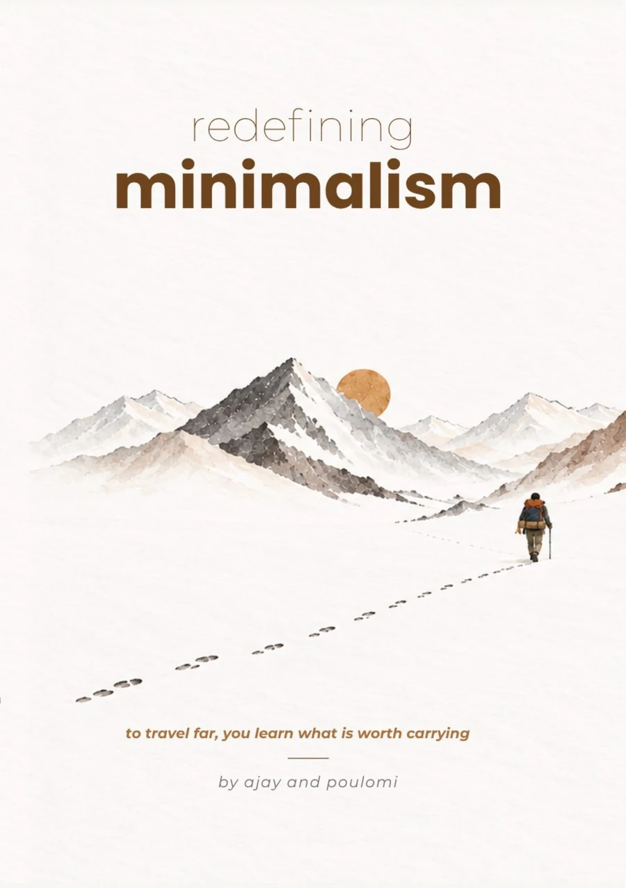 Redefining Minimalism book cover by Ajay and Poulomi: a hiker walking through snowy mountains